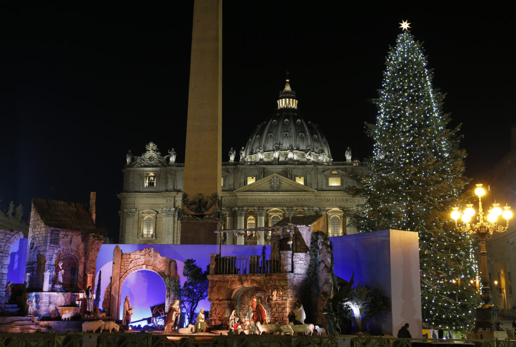 Christmas tree and Nativity scene decorate St. Peter's Square at